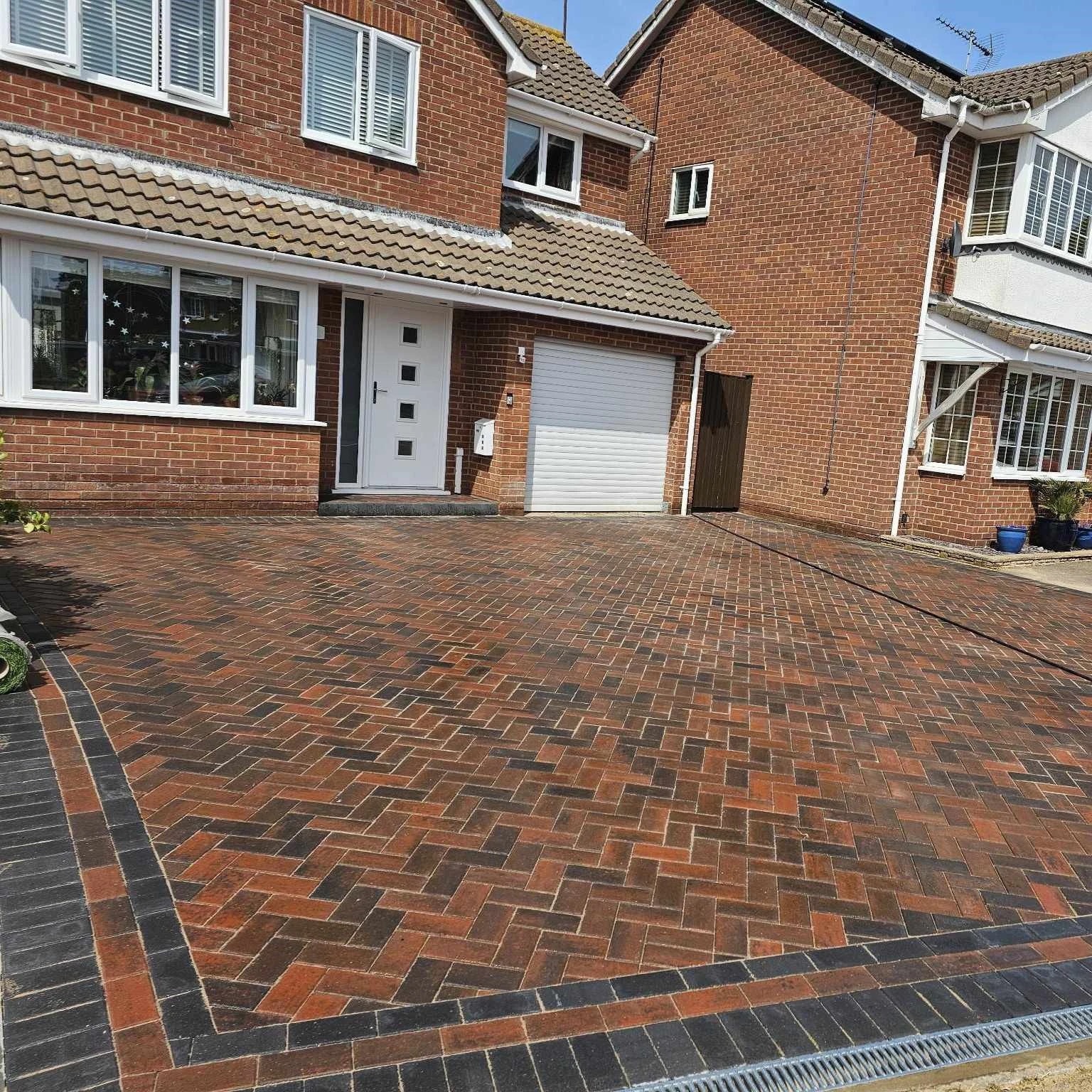 Brindle block paved driveway with charcoal border and channel drain, Ipswich