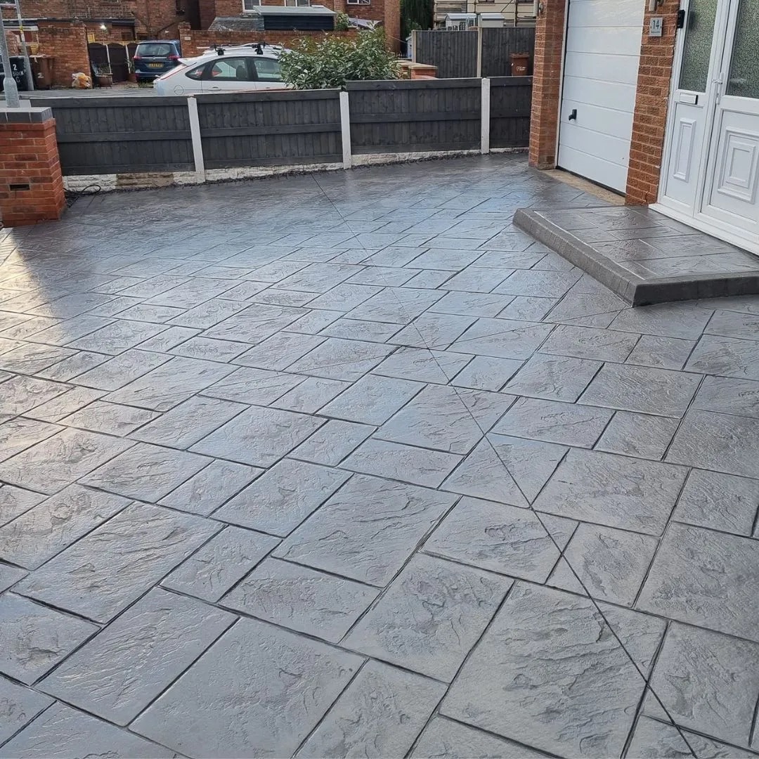 Pattern imprinted concrete driveway in Ashlar slate finish