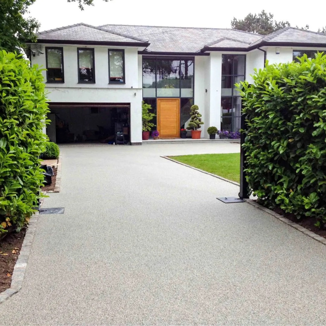 Resin bound driveway at a modern white house